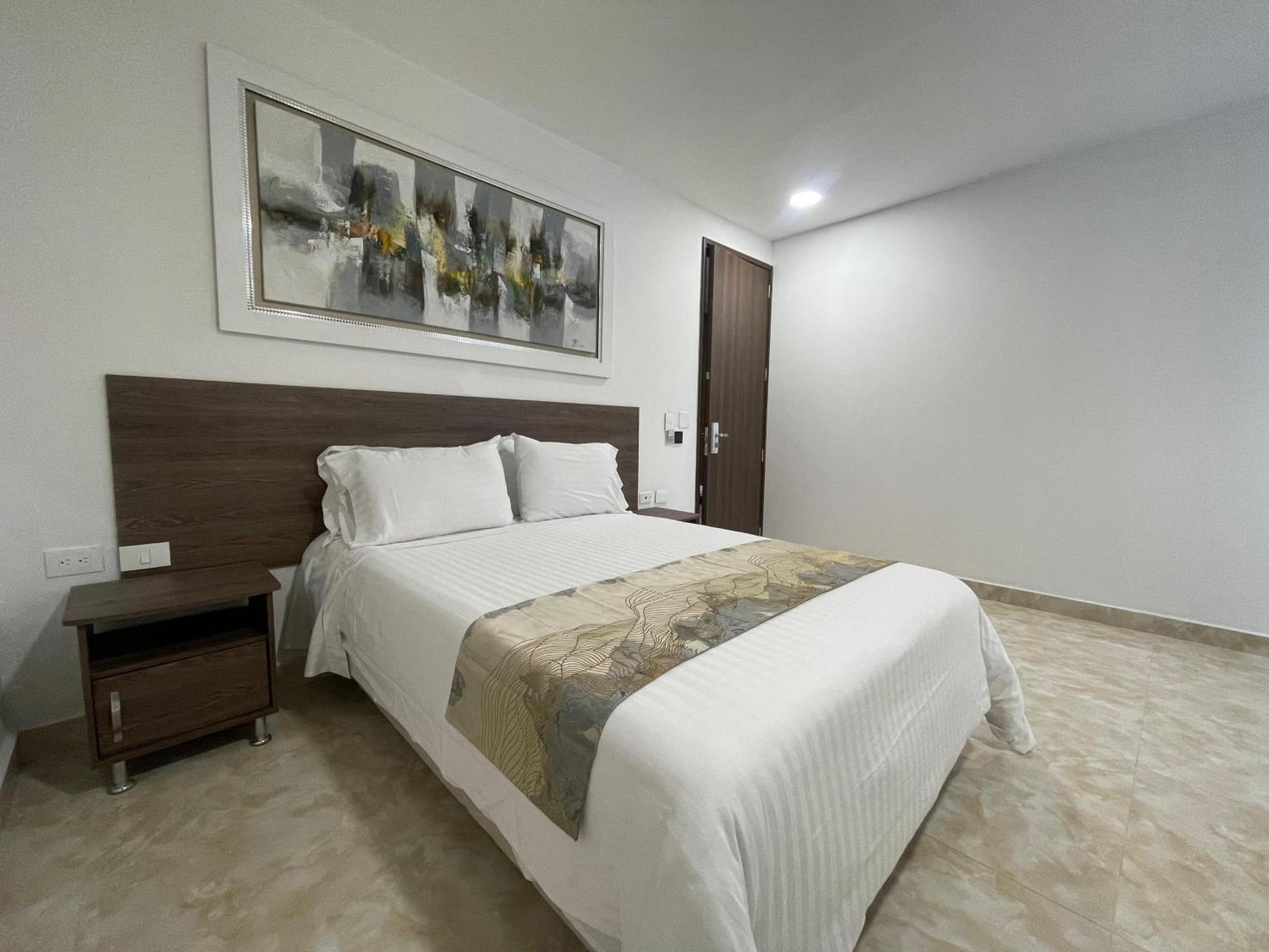 Hotel Royal Elim International Кали Екстериор снимка A bedroom in a hotel
